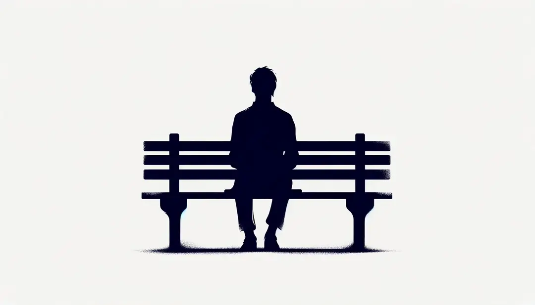 Figura humana esperando sola en un banco de parque, simbolizando el concepto de dejar plantado y qué quiere decir « poser un lapin » y su significado